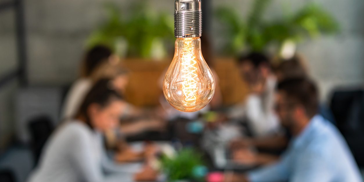 Creative business people coming up with a new idea, provisional patent applications concept