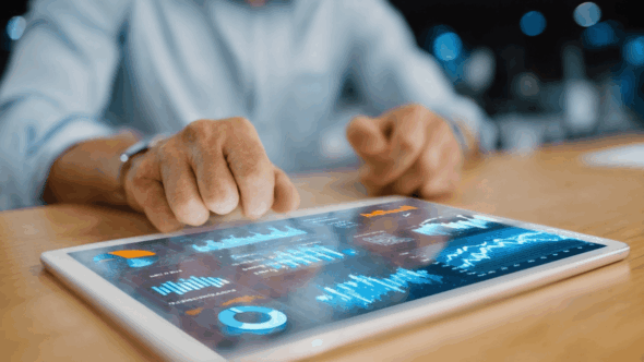 Business Method Patent Man at tablet working on new business method he invented and will apply to patent