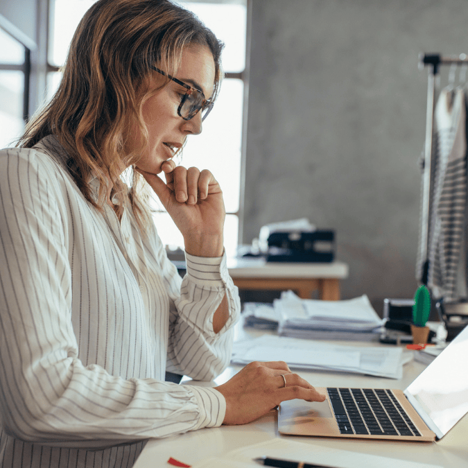 Business owner reviewing her trademark and other intellectual property
