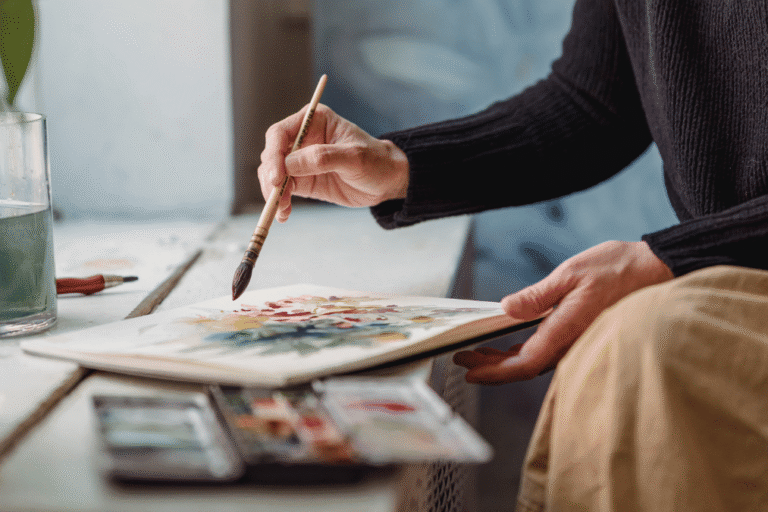 Woman painting an original work